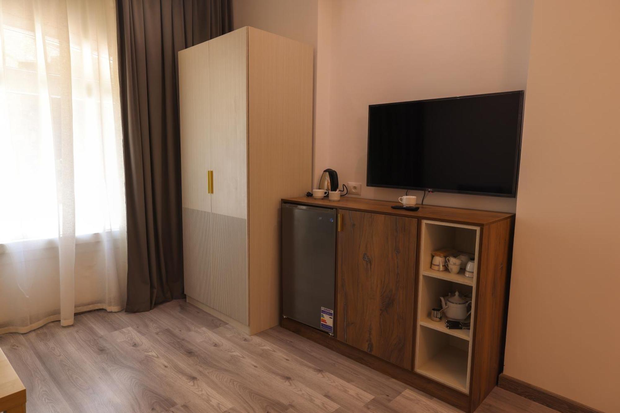 Onyx Pyramids Boutique Hotel Al Kawm al Akhdar Quarto foto